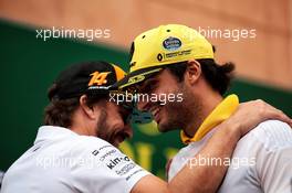 (L to R): Fernando Alonso (ESP) McLaren with Carlos Sainz Jr (ESP) Renault Sport F1 Team on the drivers parade. 27.05.2018. Formula 1 World Championship, Rd 6, Monaco Grand Prix, Monte Carlo, Monaco, Race Day.