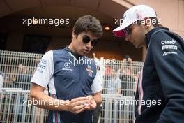 (L to R): Lance Stroll (CDN) Williams with Esteban Ocon (FRA) Sahara Force India F1 Team on the drivers parade. 27.05.2018. Formula 1 World Championship, Rd 6, Monaco Grand Prix, Monte Carlo, Monaco, Race Day.
