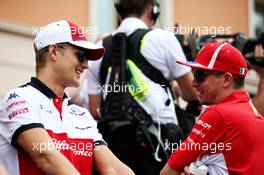 (L to R): Marcus Ericsson (SWE) Sauber F1 Team with Kimi Raikkonen (FIN) Ferrari on the drivers parade. 27.05.2018. Formula 1 World Championship, Rd 6, Monaco Grand Prix, Monte Carlo, Monaco, Race Day.