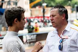 (L to R): Lando Norris (GBR) McLaren Test Driver with Zak Brown (USA) McLaren Executive Director. 24.05.2018. Formula 1 World Championship, Rd 6, Monaco Grand Prix, Monte Carlo, Monaco, Practice Day.