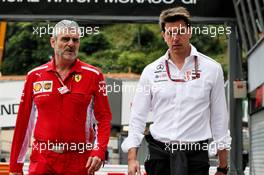 (L to R): Maurizio Arrivabene (ITA) Ferrari Team Principal with Toto Wolff (GER) Mercedes AMG F1 Shareholder and Executive Director. 24.05.2018. Formula 1 World Championship, Rd 6, Monaco Grand Prix, Monte Carlo, Monaco, Practice Day.