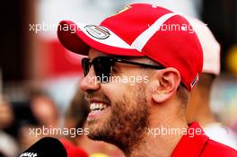 Sebastian Vettel (GER) Ferrari with the media. 23.05.2018. Formula 1 World Championship, Rd 6, Monaco Grand Prix, Monte Carlo, Monaco, Preparation Day.
