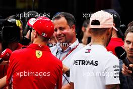 (L to R): Sebastian Vettel (GER) Ferrari and Lewis Hamilton (GBR) Mercedes AMG F1 with the media. 23.05.2018. Formula 1 World Championship, Rd 6, Monaco Grand Prix, Monte Carlo, Monaco, Preparation Day.