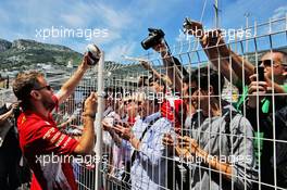 Sebastian Vettel (GER) Ferrari signs autographs for the fans. 23.05.2018. Formula 1 World Championship, Rd 6, Monaco Grand Prix, Monte Carlo, Monaco, Preparation Day.