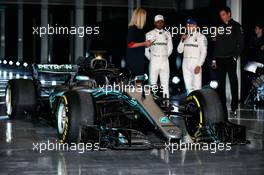 (L to R): Lewis Hamilton (GBR) Mercedes AMG F1; Valtteri Bottas (FIN) Mercedes AMG F1; and Toto Wolff (GER) Mercedes AMG F1 Shareholder and Executive Director, with the Mercedes AMG F1 W09. 22.02.2018. Mercedes AMG F1 W09 Launch, Silverstone, England.