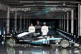 The Mercedes AMG F1 W09 with (L to R): Valtteri Bottas (FIN) Mercedes AMG F1; Toto Wolff (GER) Mercedes AMG F1 Shareholder and Executive Director; and Lewis Hamilton (GBR) Mercedes AMG F1. 22.02.2018. Mercedes AMG F1 W09 Launch, Silverstone, England.