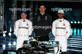 The Mercedes AMG F1 W09 with (L to R): Valtteri Bottas (FIN) Mercedes AMG F1; Toto Wolff (GER) Mercedes AMG F1 Shareholder and Executive Director; and Lewis Hamilton (GBR) Mercedes AMG F1. 22.02.2018. Mercedes AMG F1 W09 Launch, Silverstone, England.