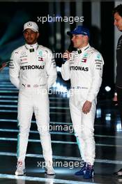 (L to R): Lewis Hamilton (GBR) Mercedes AMG F1 with team mate Valtteri Bottas (FIN) Mercedes AMG F1. 22.02.2018. Mercedes AMG F1 W09 Launch, Silverstone, England.
