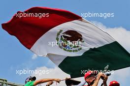 Fans in the grandstand - large Mexican flag. 26.10.2018. Formula 1 World Championship, Rd 19, Mexican Grand Prix, Mexico City, Mexico, Practice Day.