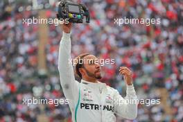 Lewis Hamilton (GBR) Mercedes AMG F1 W09 celebrates his 5th World Championship. 28.10.2018. Formula 1 World Championship, Rd 19, Mexican Grand Prix, Mexico City, Mexico, Race Day.