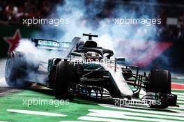 Lewis Hamilton (GBR) Mercedes AMG F1 W09 celebrates winning the World Championship. 28.10.2018. Formula 1 World Championship, Rd 19, Mexican Grand Prix, Mexico City, Mexico, Race Day.