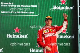 Kimi Raikkonen (FIN) Ferrari celebrates his third position on the podium. 28.10.2018. Formula 1 World Championship, Rd 19, Mexican Grand Prix, Mexico City, Mexico, Race Day.
