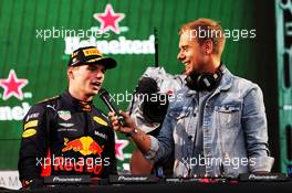 (L to R): Race winner Max Verstappen (NLD) Red Bull Racing celebrates on the podium with Armin van Buuren (NLD) DJ. 28.10.2018. Formula 1 World Championship, Rd 19, Mexican Grand Prix, Mexico City, Mexico, Race Day.