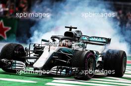 Lewis Hamilton (GBR) Mercedes AMG F1 W09 celebrates winning the World Championship. 28.10.2018. Formula 1 World Championship, Rd 19, Mexican Grand Prix, Mexico City, Mexico, Race Day.