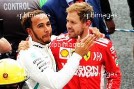 (L to R): Race winner Lewis Hamilton (GBR) Mercedes AMG F1 celebrates winning the World Championship in parc ferme with Sebastian Vettel (GER) Ferrari. 28.10.2018. Formula 1 World Championship, Rd 19, Mexican Grand Prix, Mexico City, Mexico, Race Day.