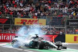 Lewis Hamilton (GBR) Mercedes AMG F1 W09 celebrates his 5th World Championship. 28.10.2018. Formula 1 World Championship, Rd 19, Mexican Grand Prix, Mexico City, Mexico, Race Day.