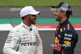 Lewis Hamilton (GBR) Mercedes AMG F1 W09 and Daniel Ricciardo (AUS) Red Bull Racing RB14. 27.10.2018. Formula 1 World Championship, Rd 19, Mexican Grand Prix, Mexico City, Mexico, Qualifying Day.