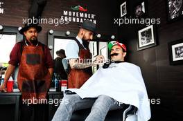 Sergio Perez (MEX) Racing Point Force India F1 Team visits the paddock barbers. 25.10.2018. Formula 1 World Championship, Rd 19, Mexican Grand Prix, Mexico City, Mexico, Preparation Day.