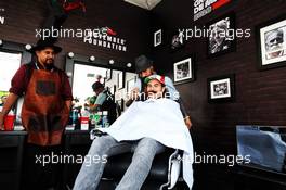 Sergio Perez (MEX) Racing Point Force India F1 Team visits the paddock barbers. 25.10.2018. Formula 1 World Championship, Rd 19, Mexican Grand Prix, Mexico City, Mexico, Preparation Day.