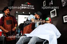 Sergio Perez (MEX) Racing Point Force India F1 Team visits the paddock barbers. 25.10.2018. Formula 1 World Championship, Rd 19, Mexican Grand Prix, Mexico City, Mexico, Preparation Day.