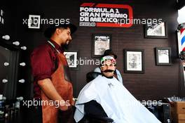 Sergio Perez (MEX) Racing Point Force India F1 Team visits the paddock barbers. 25.10.2018. Formula 1 World Championship, Rd 19, Mexican Grand Prix, Mexico City, Mexico, Preparation Day.