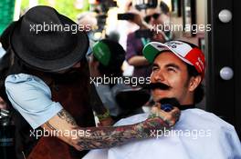 Sergio Perez (MEX) Racing Point Force India F1 Team visits the paddock barbers for the Movember Foundation charity. 25.10.2018. Formula 1 World Championship, Rd 19, Mexican Grand Prix, Mexico City, Mexico, Preparation Day.