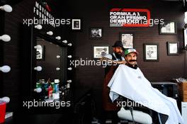 Sergio Perez (MEX) Racing Point Force India F1 Team visits the paddock barbers. 25.10.2018. Formula 1 World Championship, Rd 19, Mexican Grand Prix, Mexico City, Mexico, Preparation Day.