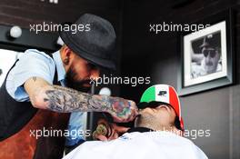 Sergio Perez (MEX) Racing Point Force India F1 Team visits the paddock barbers. 25.10.2018. Formula 1 World Championship, Rd 19, Mexican Grand Prix, Mexico City, Mexico, Preparation Day.