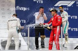 The podium (L to R): Valtteri Bottas (FIN) Mercedes AMG F1 with Sebastian Vettel (GER) Ferrari and race winner Lewis Hamilton (GBR) Mercedes AMG F1. 30.09.2018. Formula 1 World Championship, Rd 16, Russian Grand Prix, Sochi Autodrom, Sochi, Russia, Race Day.