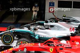 Race winner Lewis Hamilton (GBR) Mercedes AMG F1 W09 in parc ferme with Sebastian Vettel (GER) Ferrari SF71H and team mate Valtteri Bottas (FIN) Mercedes AMG F1. 30.09.2018. Formula 1 World Championship, Rd 16, Russian Grand Prix, Sochi Autodrom, Sochi, Russia, Race Day.