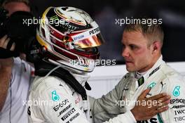 (L to R): Race winner Lewis Hamilton (GBR) Mercedes AMG F1 in parc ferme with second placed team mate Valtteri Bottas (FIN) Mercedes AMG F1. 30.09.2018. Formula 1 World Championship, Rd 16, Russian Grand Prix, Sochi Autodrom, Sochi, Russia, Race Day.