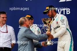 Race winner Lewis Hamilton (GBR) Mercedes AMG F1 with Vladimir Putin (RUS) Russian Federation President on the podium. 30.09.2018. Formula 1 World Championship, Rd 16, Russian Grand Prix, Sochi Autodrom, Sochi, Russia, Race Day.