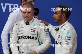 Valtteri Bottas (FIN) Mercedes AMG F1 and 1st place Lewis Hamilton (GBR) Mercedes AMG F1 W09. 30.09.2018. Formula 1 World Championship, Rd 16, Russian Grand Prix, Sochi Autodrom, Sochi, Russia, Race Day.