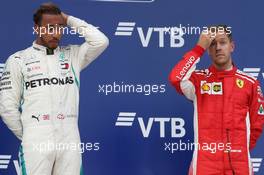 1st place Lewis Hamilton (GBR) Mercedes AMG F1 W09 and 3rd place Sebastian Vettel (GER) Ferrari SF71H. 30.09.2018. Formula 1 World Championship, Rd 16, Russian Grand Prix, Sochi Autodrom, Sochi, Russia, Race Day.