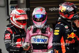 (L to R): Kevin Magnussen (DEN) Haas F1 Team with Sergio Perez (MEX) Racing Point Force India F1 Team and Max Verstappen (NLD) Red Bull Racing in parc ferme. 30.09.2018. Formula 1 World Championship, Rd 16, Russian Grand Prix, Sochi Autodrom, Sochi, Russia, Race Day.