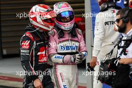 (L to R): Kevin Magnussen (DEN) Haas F1 Team with Sergio Perez (MEX) Racing Point Force India F1 Team in parc ferme. 30.09.2018. Formula 1 World Championship, Rd 16, Russian Grand Prix, Sochi Autodrom, Sochi, Russia, Race Day.