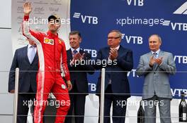 Sebastian Vettel (GER) Ferrari celebrates his third position on the podium. 30.09.2018. Formula 1 World Championship, Rd 16, Russian Grand Prix, Sochi Autodrom, Sochi, Russia, Race Day.