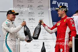 (L to R): Valtteri Bottas (FIN) Mercedes AMG F1 celebrates his second position with third placed Sebastian Vettel (GER) Ferrari. 30.09.2018. Formula 1 World Championship, Rd 16, Russian Grand Prix, Sochi Autodrom, Sochi, Russia, Race Day.