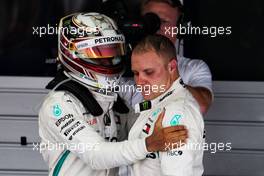 (L to R): Race winner Lewis Hamilton (GBR) Mercedes AMG F1 with team mate Valtteri Bottas (FIN) Mercedes AMG F1 in parc ferme. 30.09.2018. Formula 1 World Championship, Rd 16, Russian Grand Prix, Sochi Autodrom, Sochi, Russia, Race Day.