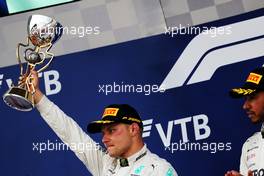 Valtteri Bottas (FIN) Mercedes AMG F1 celebrates his second position on the podium with team mate Lewis Hamilton (GBR) Mercedes AMG F1. 30.09.2018. Formula 1 World Championship, Rd 16, Russian Grand Prix, Sochi Autodrom, Sochi, Russia, Race Day.