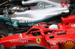 Lewis Hamilton (GBR) Mercedes AMG F1 W09 and Sebastian Vettel (GER) Ferrari SF71H. 30.09.2018. Formula 1 World Championship, Rd 16, Russian Grand Prix, Sochi Autodrom, Sochi, Russia, Race Day.
