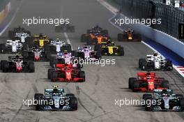 (L to R): Valtteri Bottas (FIN) Mercedes AMG F1 W09 and Lewis Hamilton (GBR) Mercedes AMG F1 W09 lead at the start of the race. 30.09.2018. Formula 1 World Championship, Rd 16, Russian Grand Prix, Sochi Autodrom, Sochi, Russia, Race Day.
