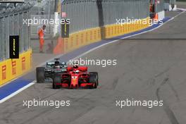 Sebastian Vettel (GER) Scuderia Ferrari and Lewis Hamilton (GBR) Mercedes AMG F1   30.09.2018. Formula 1 World Championship, Rd 16, Russian Grand Prix, Sochi Autodrom, Sochi, Russia, Race Day.