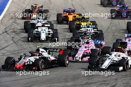 (L to R): Kevin Magnussen (DEN) Haas VF-18; Esteban Ocon (FRA) Racing Point Force India F1 VJM11; and Charles Leclerc (MON) Sauber F1 Team C37, at the start of the race. 30.09.2018. Formula 1 World Championship, Rd 16, Russian Grand Prix, Sochi Autodrom, Sochi, Russia, Race Day.