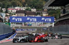 Lewis Hamilton (GBR) Mercedes AMG F1 W09 and Sebastian Vettel (GER) Ferrari SF71H at the start of the race. 30.09.2018. Formula 1 World Championship, Rd 16, Russian Grand Prix, Sochi Autodrom, Sochi, Russia, Race Day.