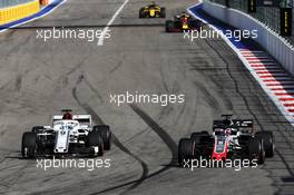 Marcus Ericsson (SWE) Sauber C37 and Romain Grosjean (FRA) Haas F1 Team VF-18 battle for position. 30.09.2018. Formula 1 World Championship, Rd 16, Russian Grand Prix, Sochi Autodrom, Sochi, Russia, Race Day.