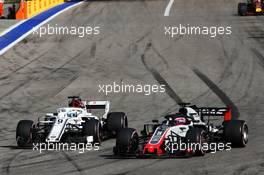 Marcus Ericsson (SWE) Sauber C37 and Romain Grosjean (FRA) Haas F1 Team VF-18 battle for position. 30.09.2018. Formula 1 World Championship, Rd 16, Russian Grand Prix, Sochi Autodrom, Sochi, Russia, Race Day.