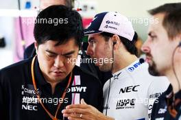 Sergio Perez (MEX) Racing Point Force India F1 Team with Jun Matsuzaki (JPN) Racing Point Force India F1 Team Senior Tyre Engineer. 29.09.2018. Formula 1 World Championship, Rd 16, Russian Grand Prix, Sochi Autodrom, Sochi, Russia, Qualifying Day.