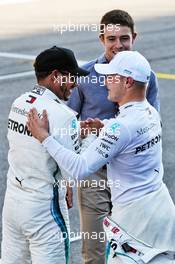 (L to R): Lewis Hamilton (GBR) Mercedes AMG F1 celebrates with team mate and pole sitter Valtteri Bottas (FIN) Mercedes AMG F1 in qualifying parc ferme. 29.09.2018. Formula 1 World Championship, Rd 16, Russian Grand Prix, Sochi Autodrom, Sochi, Russia, Qualifying Day.