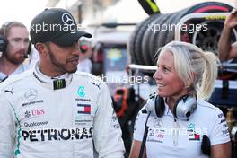 Lewis Hamilton (GBR) Mercedes AMG F1 with Angela Cullen (NZL) Mercedes AMG F1 Physiotherapist. 29.09.2018. Formula 1 World Championship, Rd 16, Russian Grand Prix, Sochi Autodrom, Sochi, Russia, Qualifying Day.